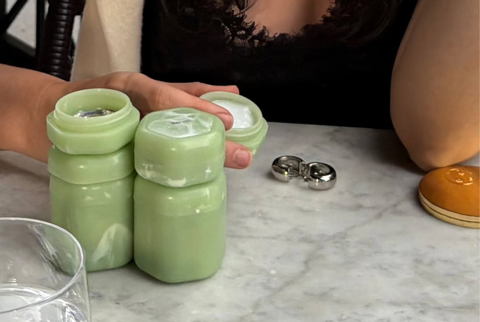 Click to shop the Cadence Memorial Day Weekend Sale. Image of Jade Capsules on a table.
