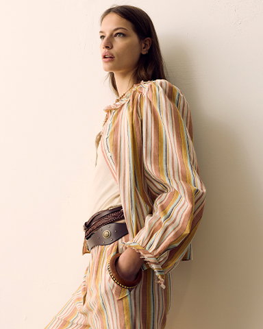 Woman wearing a Pink Mix Per Una Pure Cotton Striped Blouson Sleeve