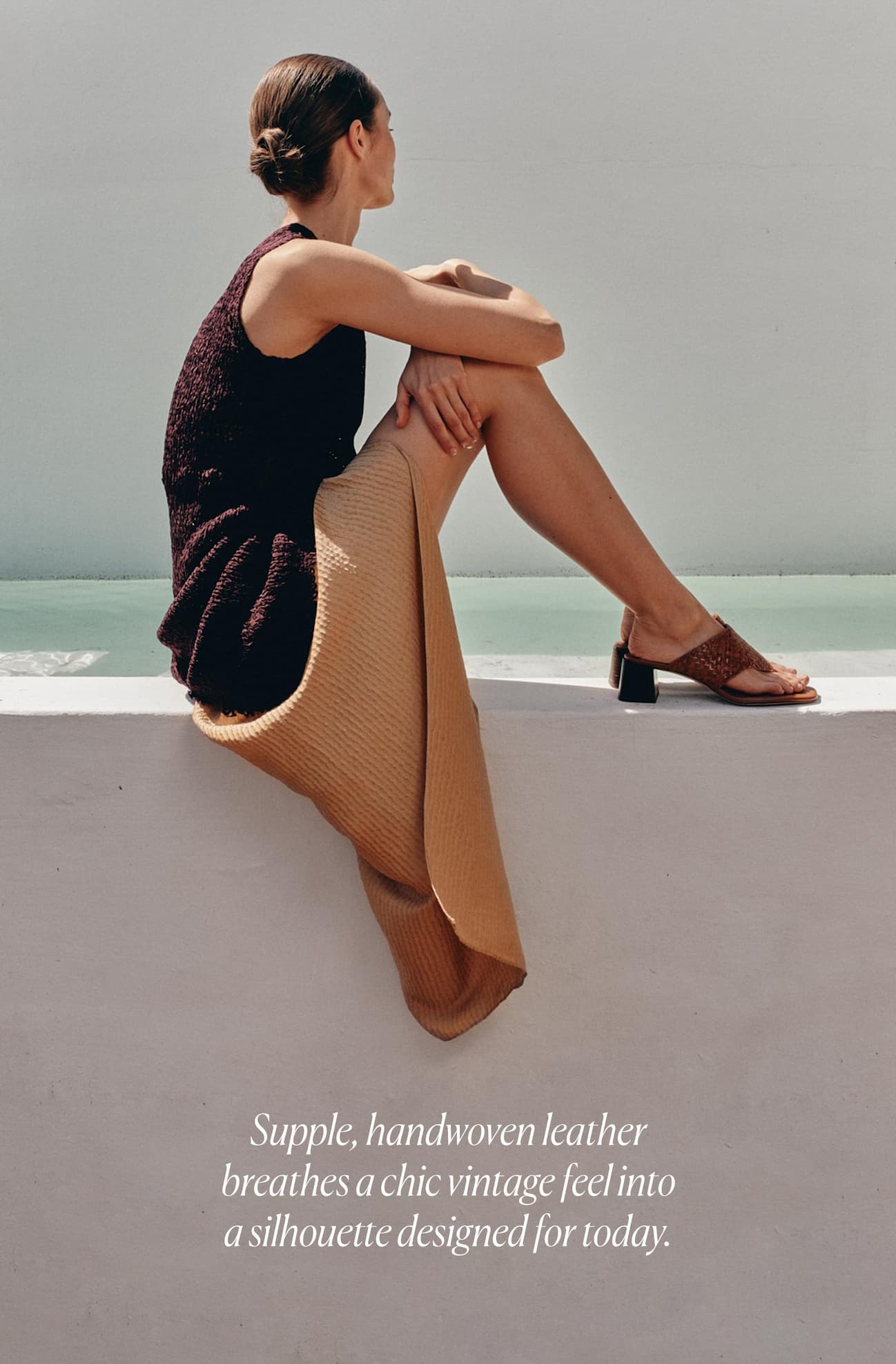 Supple, handwoven leather breathes a chic vintage feel into a silhouette designed for today.