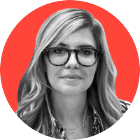 A black and white headshot shows Emma Barnett looking at the camera. Her picture is superimposed in front of a red background. She has long blonde hair and wears glasses.