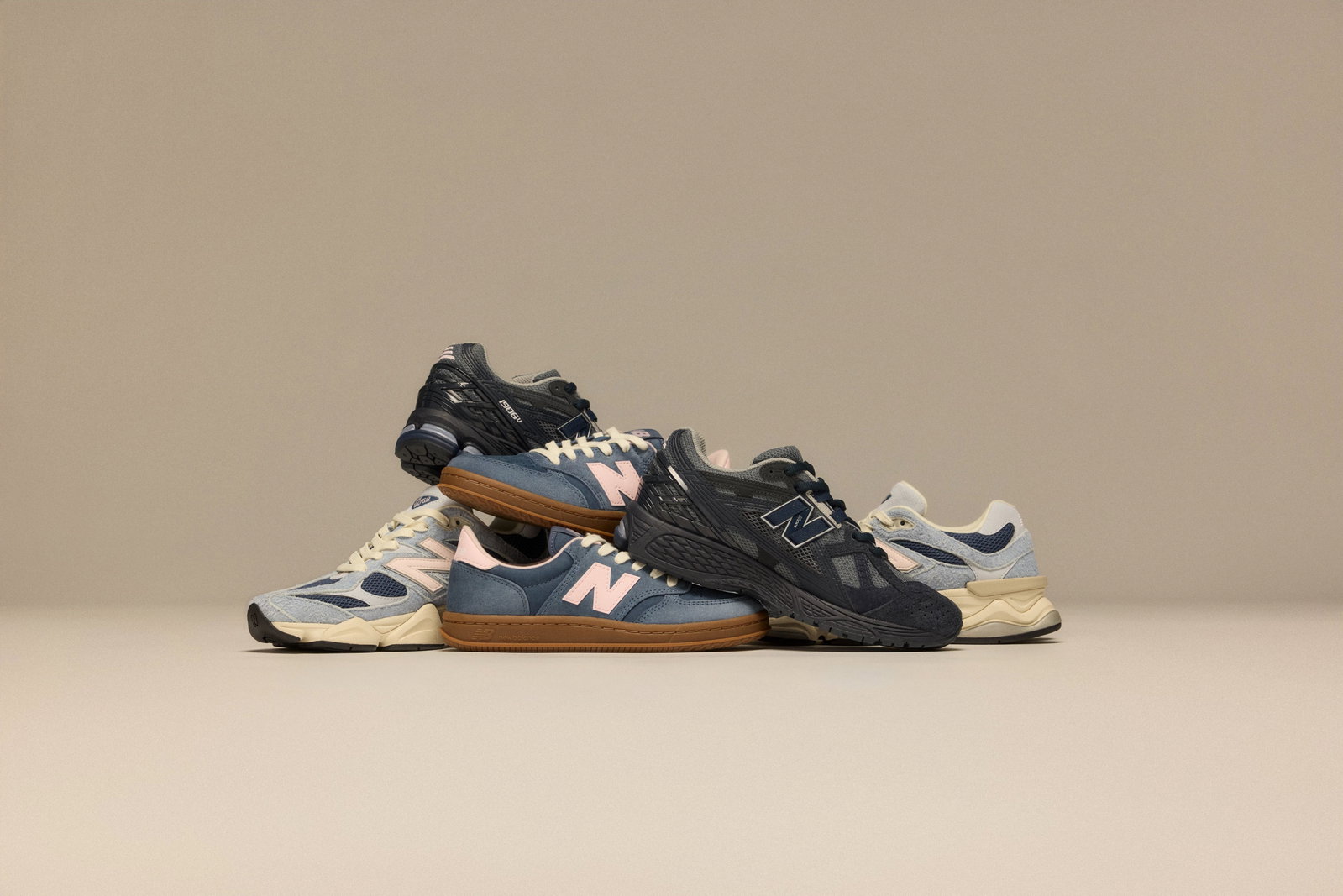 Various New Balance shoes pictured including 9060 (U9060NVP), T500 (CT500NVP), and 1906 (U1906NG)