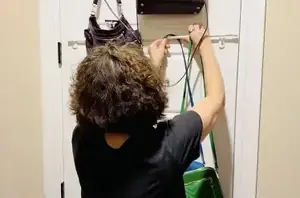 This tension rod hack is EXACTLY what you need to keep all your handbags in order