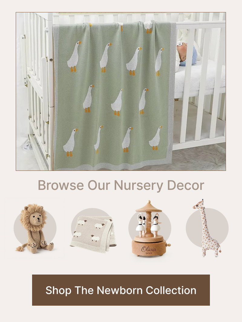 Nursery crib with patterned curtains and small decorative nursery accessories shown above a brown button reading Shop The Newborn Collection.