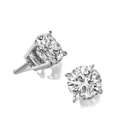 Round diamond stud earrings in white gold four-prong settings.