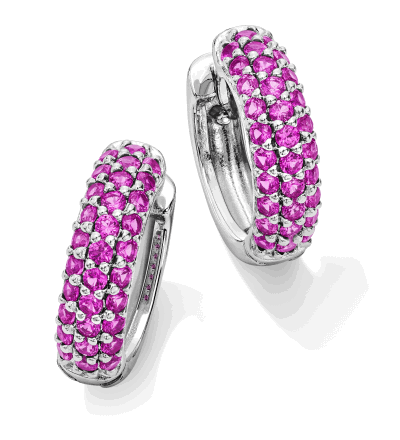 Silver hoop earring with three rows of pavé pink gemstones.