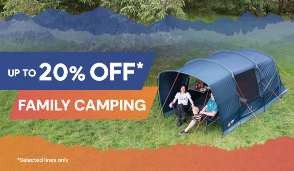 UP TO 20% OFF FAMILY CAMPING* *Selected lines only. A man and a woman sit in the porch of a Vango Savannah 400 4-Person Poled Tent in blue.