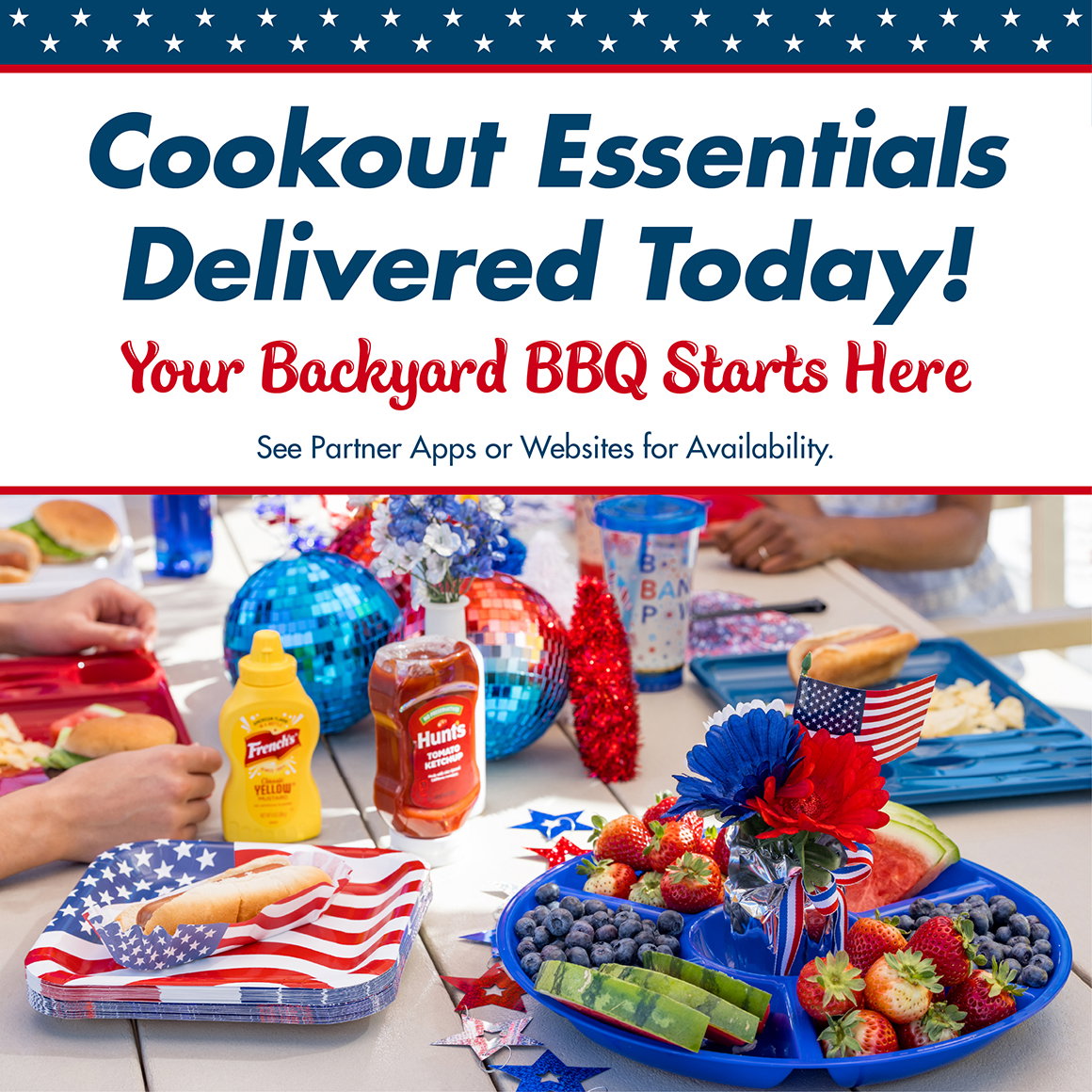 Cookout Essentials Delivered Today! Your Backyard BBQ Starts Here. See partner apps or websites for availability.  An image of a table decorated with patriotic decor and cookout food essentials including plates, serving trays, fruit, ketchup and mustard.