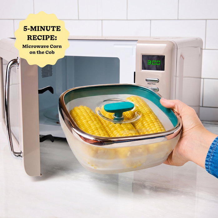 Anyday Square Dish with 3 ears of corn going into the microwave