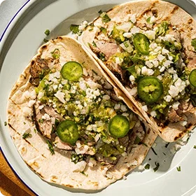 Grilled Pork Tacos with Tomatillo-Avocado Salsa