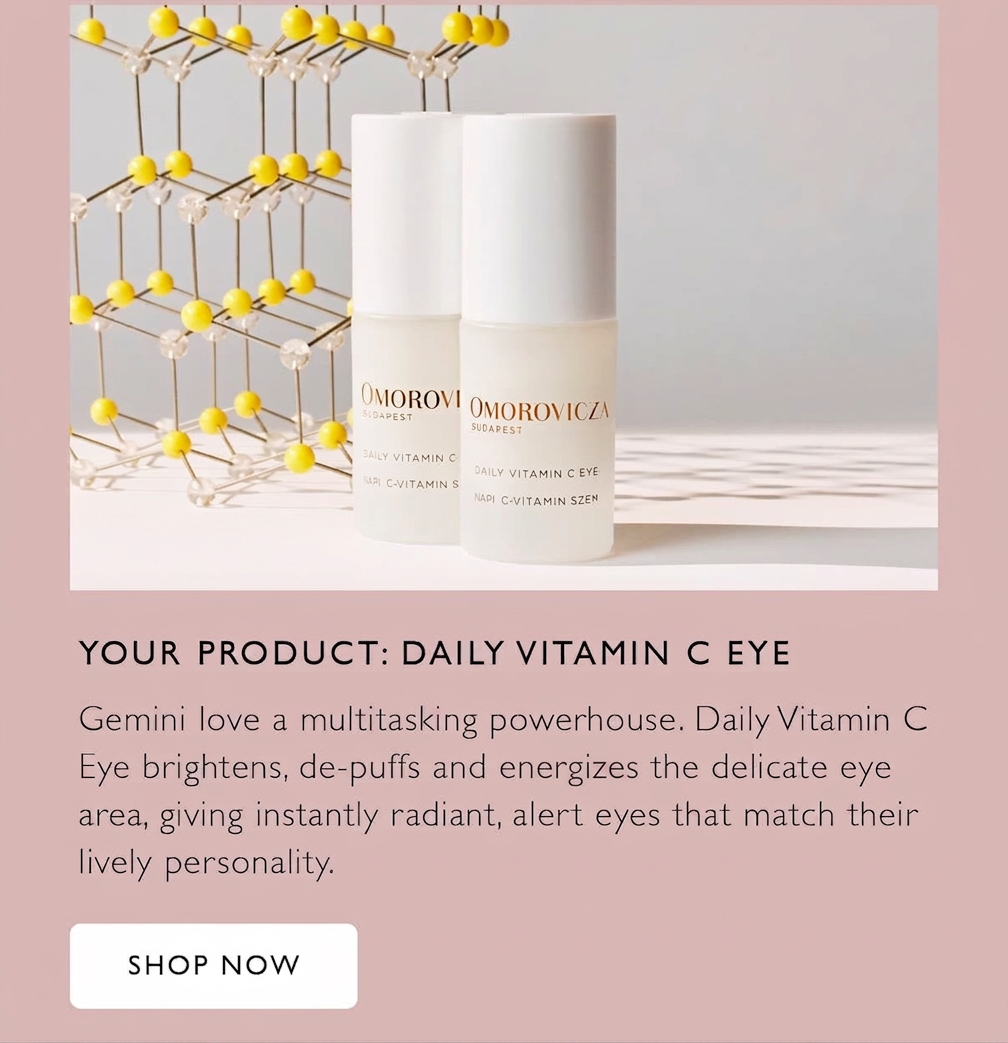 Two bottles of Omorovicza Daily Vitamin C Eye cream with a molecular structure decoration.