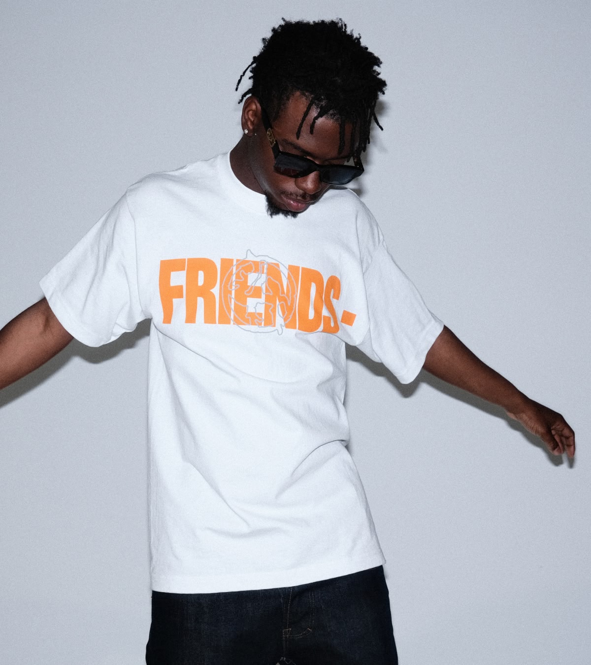 Shop the VLONE x LOSTHILLS collab, including this white tee that has the word "Friends" in orange.
