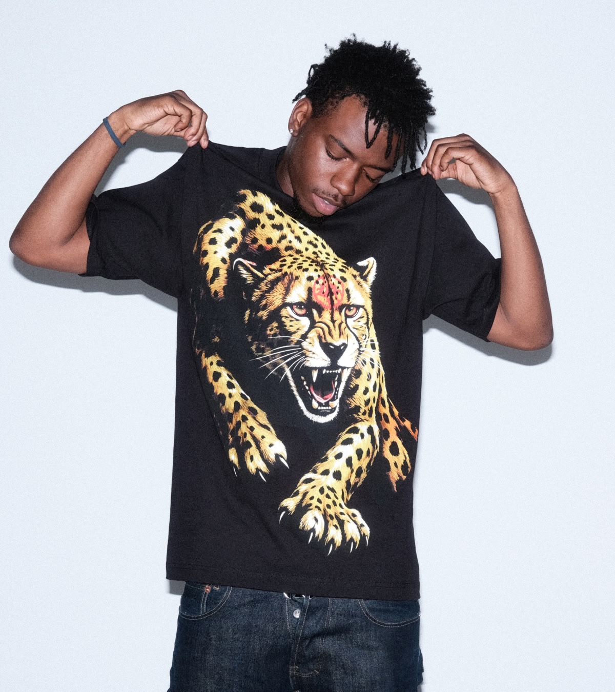Shop the VLONE x LOSTHILLS collab, featuring this black graphic tee with a cheetah.