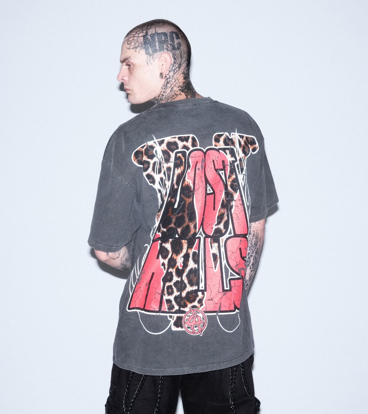 Shop the VLONE x LOSTHILLS collab, featuring this gray tee with a cheetah-print "V" and the words "Lost Hills" in red.
