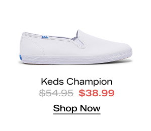 A side view of the Keds Champion Canvas Slip-On in white. The style was $54.95 and is now $38.99 for a limited time. Shop Now.