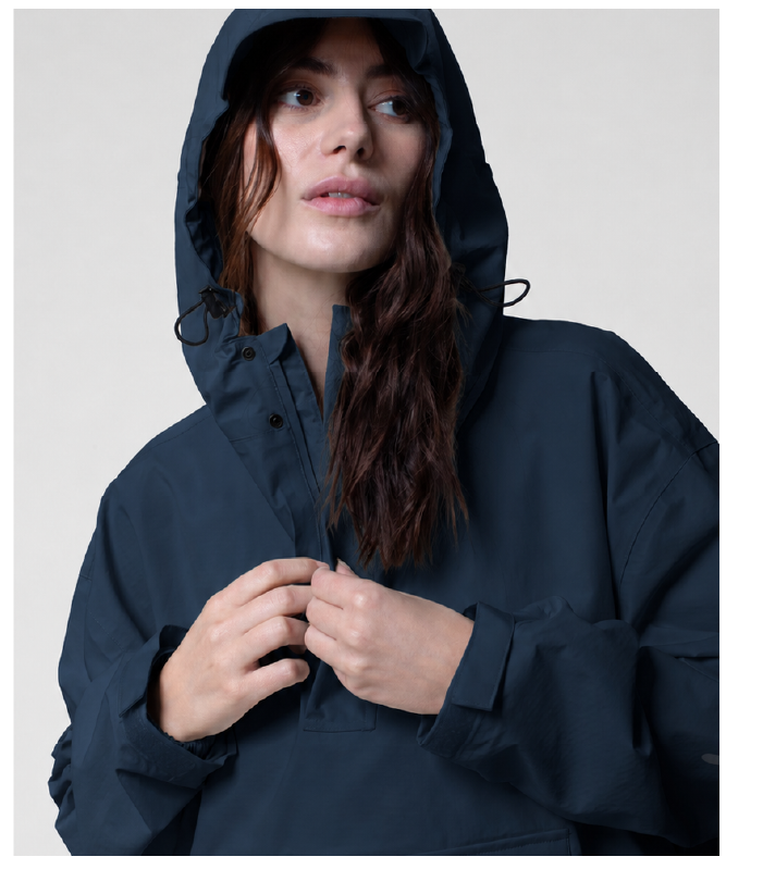 Woman wearing Stride Pullover Poncho in Navy
