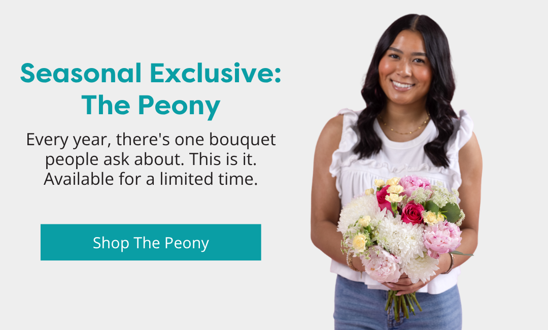 Woman holding Callia's Peony bouquet