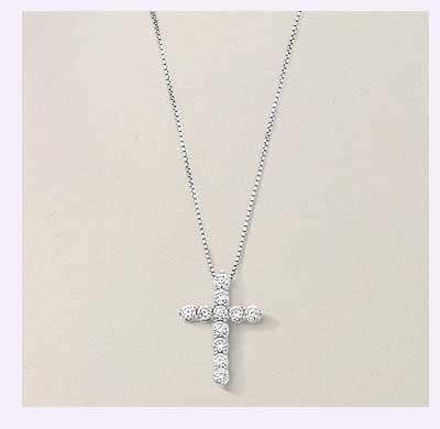 Silver chain necklace with diamond cross pendant.