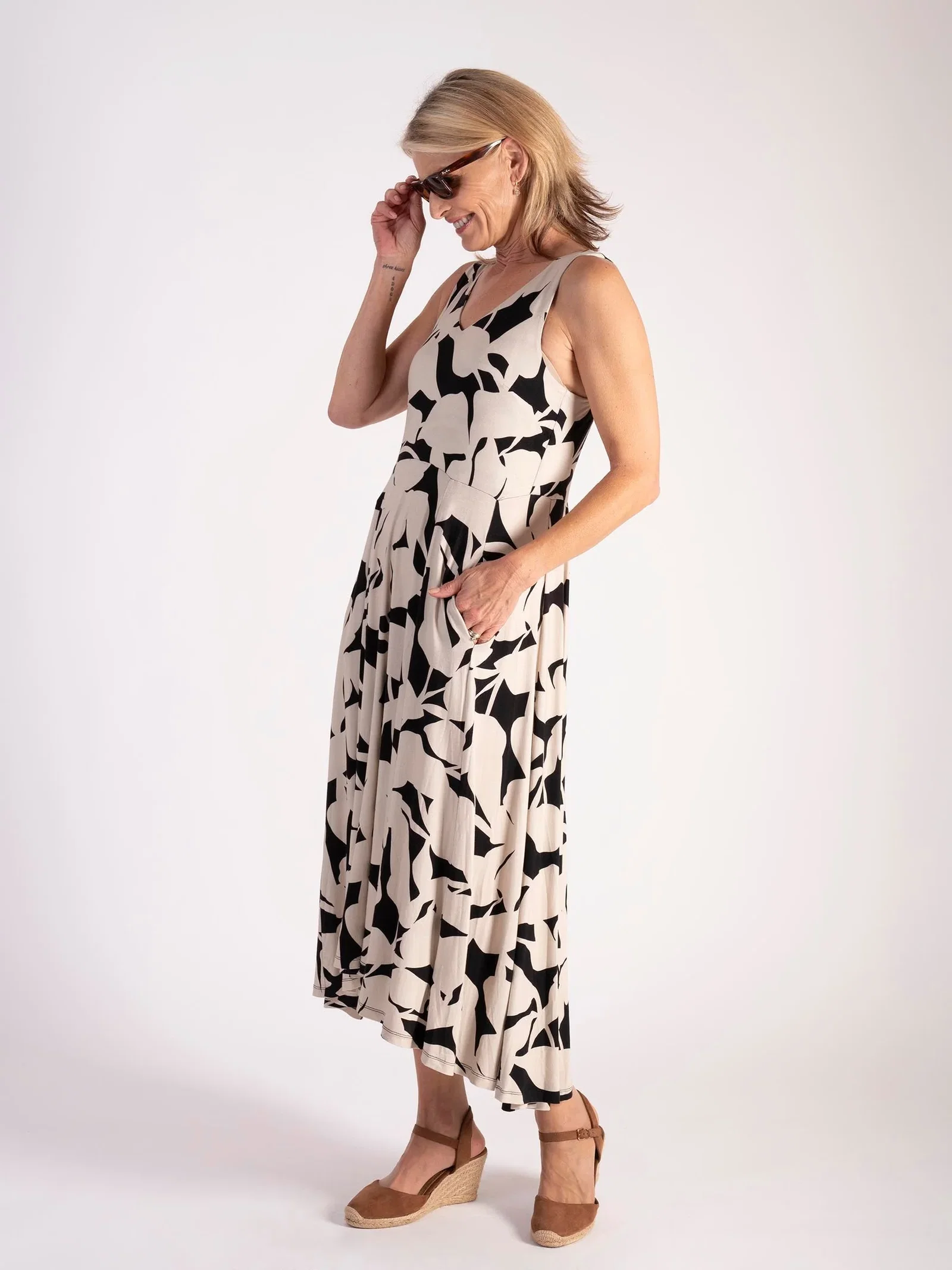Image of Latte/Black Abstract Floral Print Sleeveless High-Low Jersey Dress