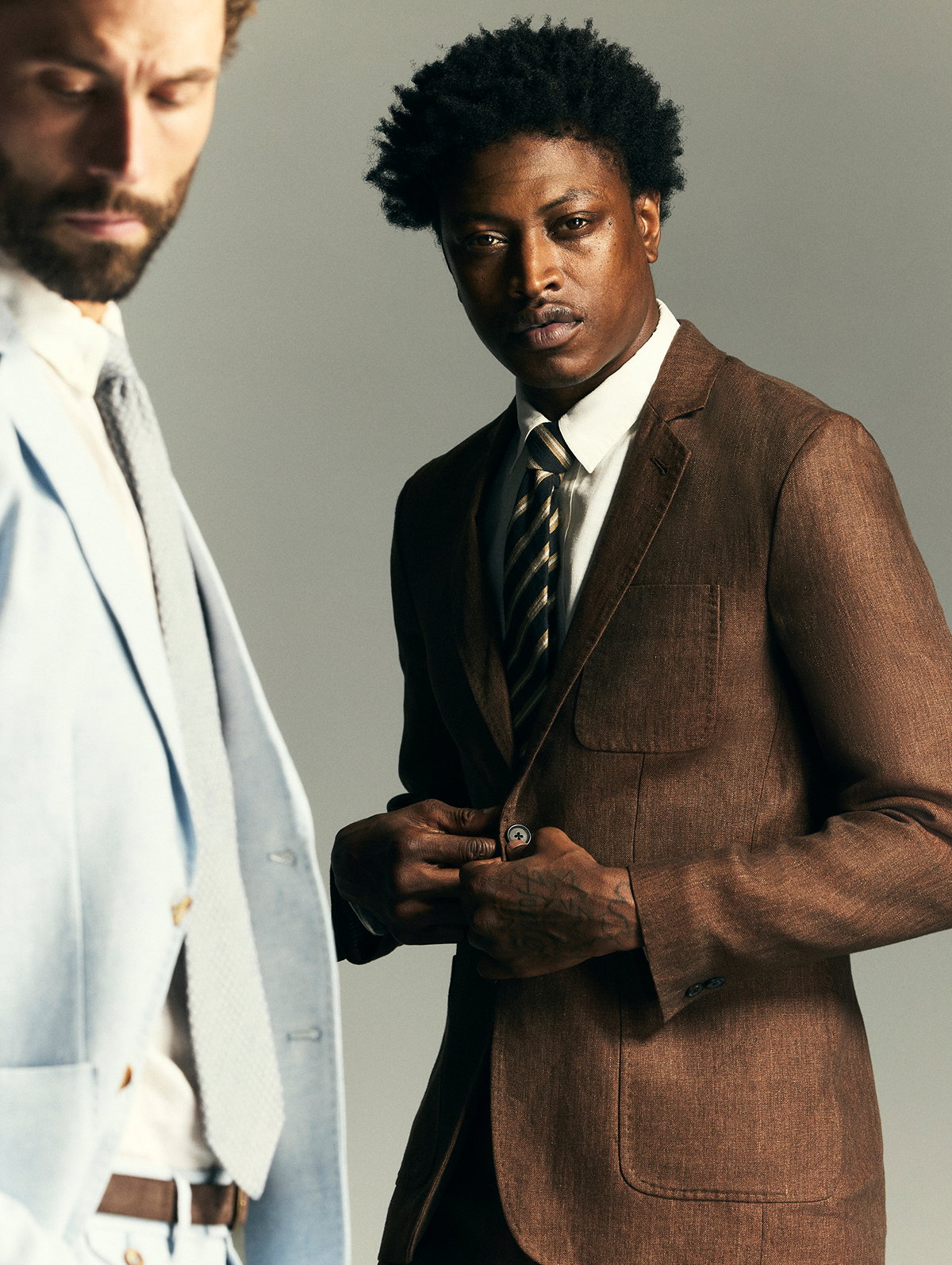 Models wear Billy Reid suiting.