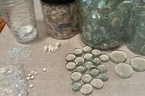 Use seashells and glass gems to add more beachy summer vibes to your home