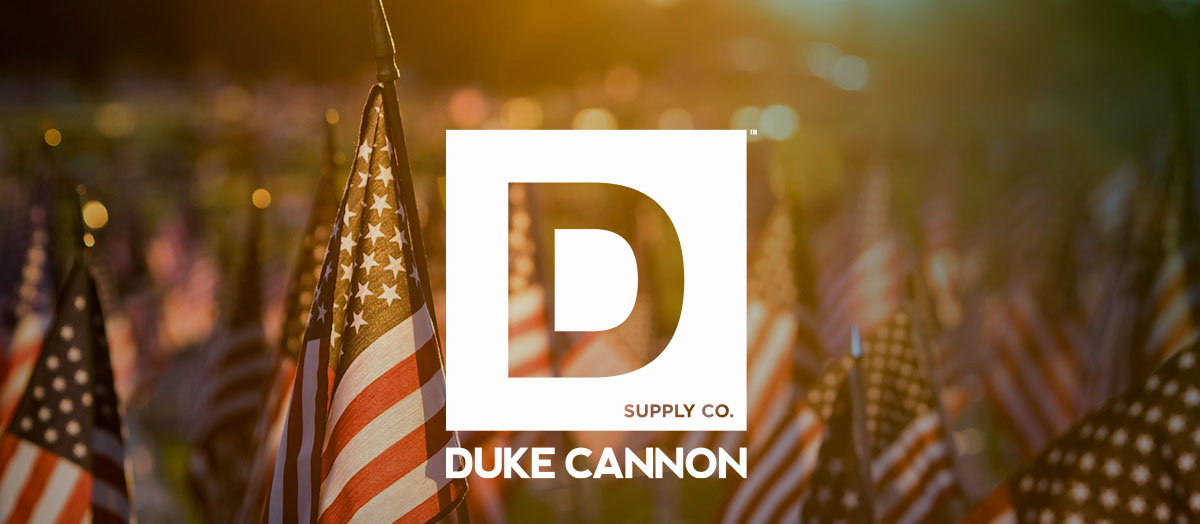 The Duke Cannon. American flags in the background.