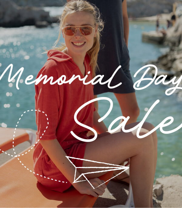 Memorial Day Sale - Image of a woman sitting on a beach