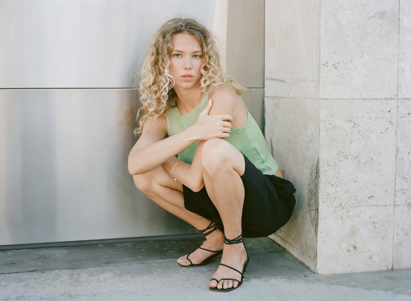 woman wearing black sandals