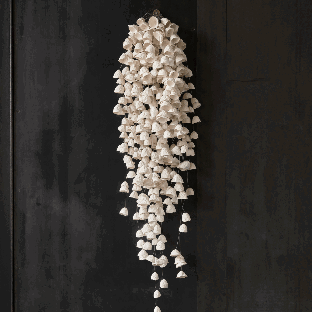 white hanging sculpture