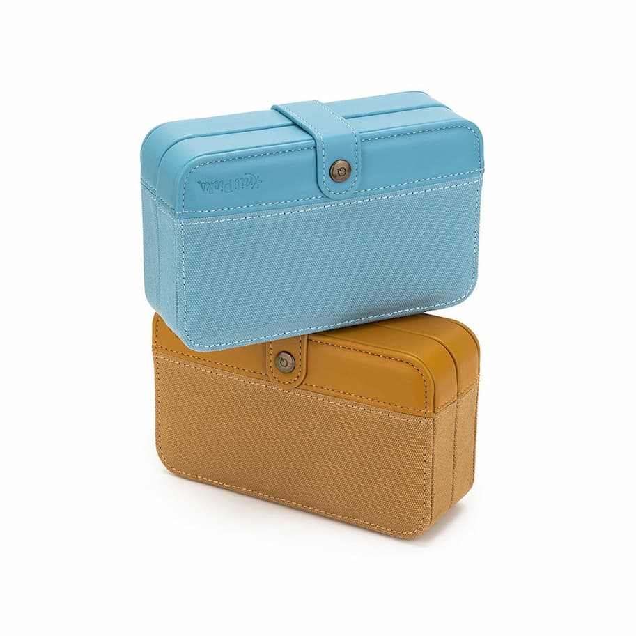 Two needle cases in tan and teal >>