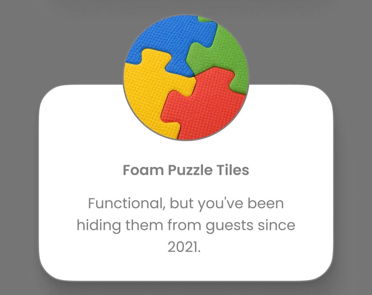 A circular arrangement of four interlocking foam puzzle pieces in red, yellow, blue, and green is shown above a white rounded rectangle containing the...