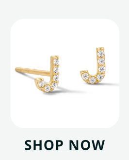 Gold stud earrings shaped like the letter 