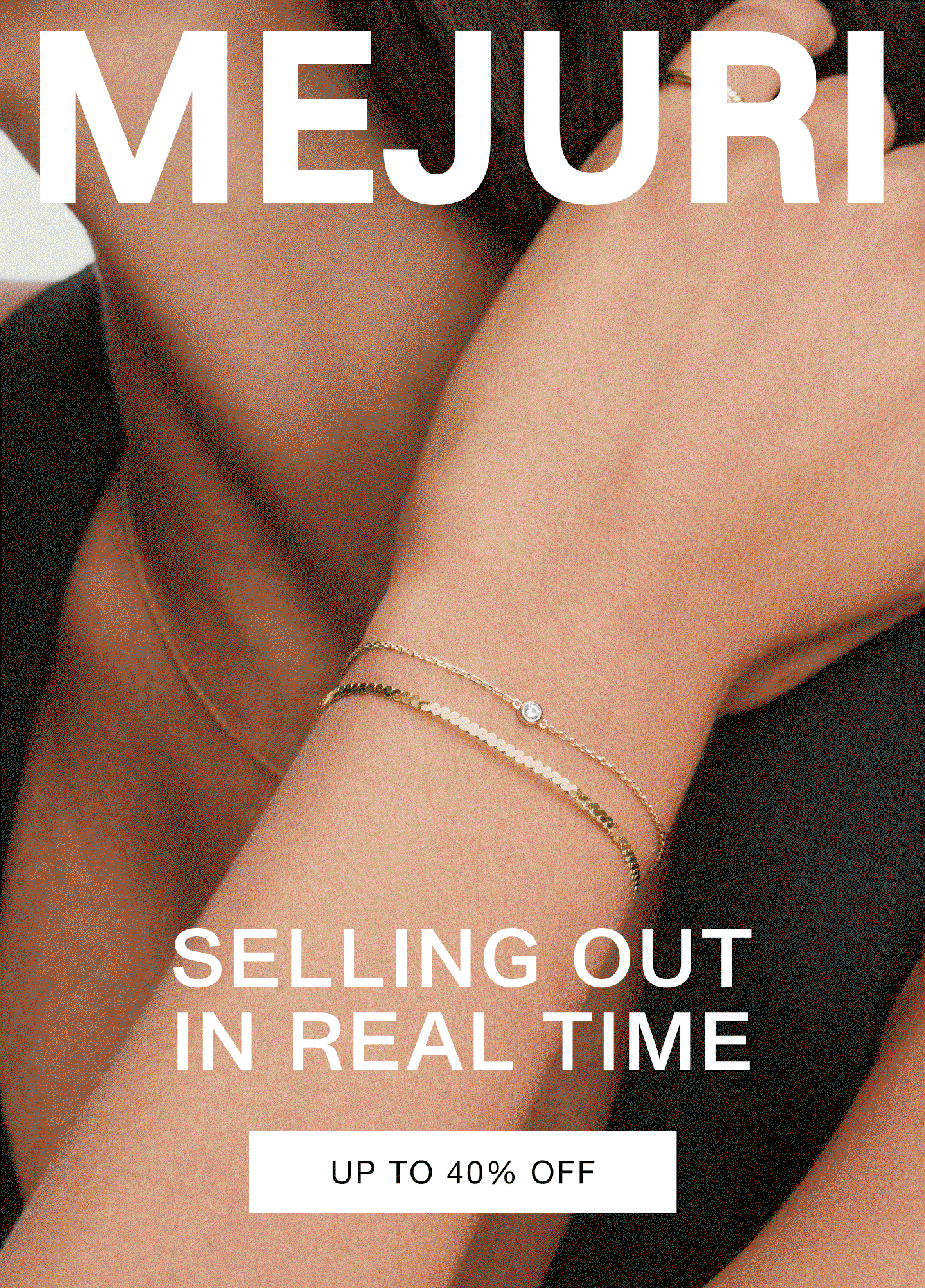 Woman wearing a silver open heart pendant necklace and gold layered bracelets. Text reads: Selling Out In Real Time — Up to 40% Off.