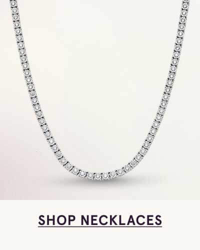 Classic tennis bracelet made up of round-cut diamond stones. Click here to shop necklaces