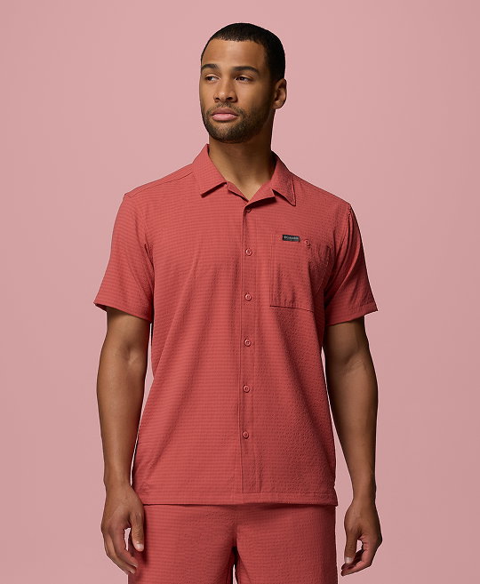 Man wearing red Columbia button up. 