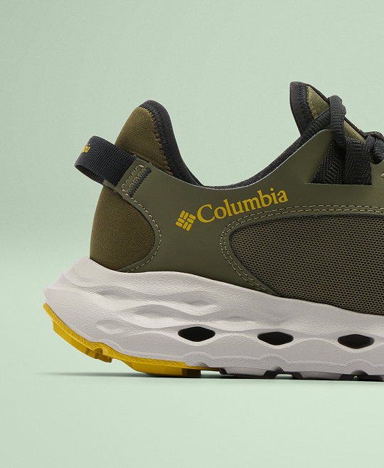 Side profile of green Columbia shoe.