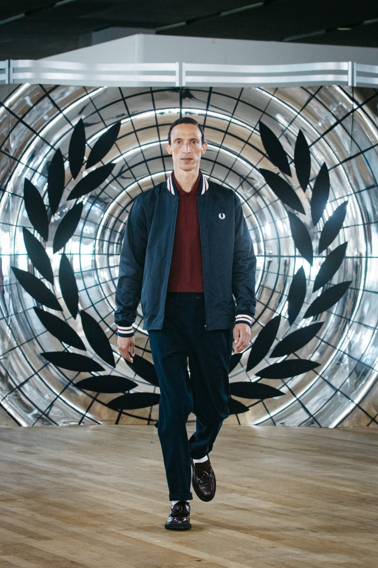 Model wearing a Fred Perry Twill Tennis Bomber Jacket