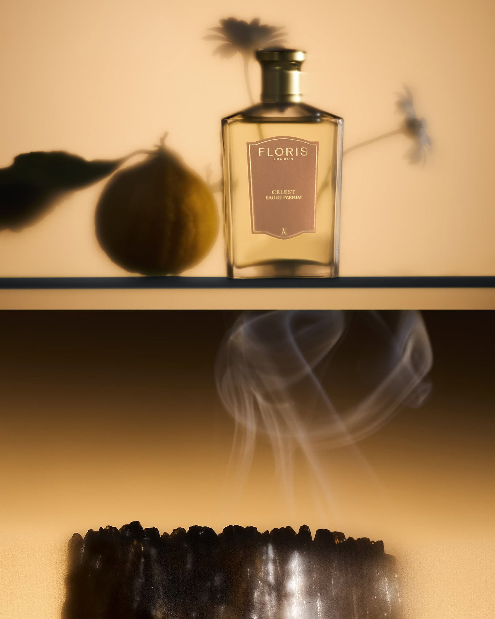 A bottle of Floris Celest perfume stands beside a bergamot and chamomile, above a section of smoking opoponax, all set against a warm background.