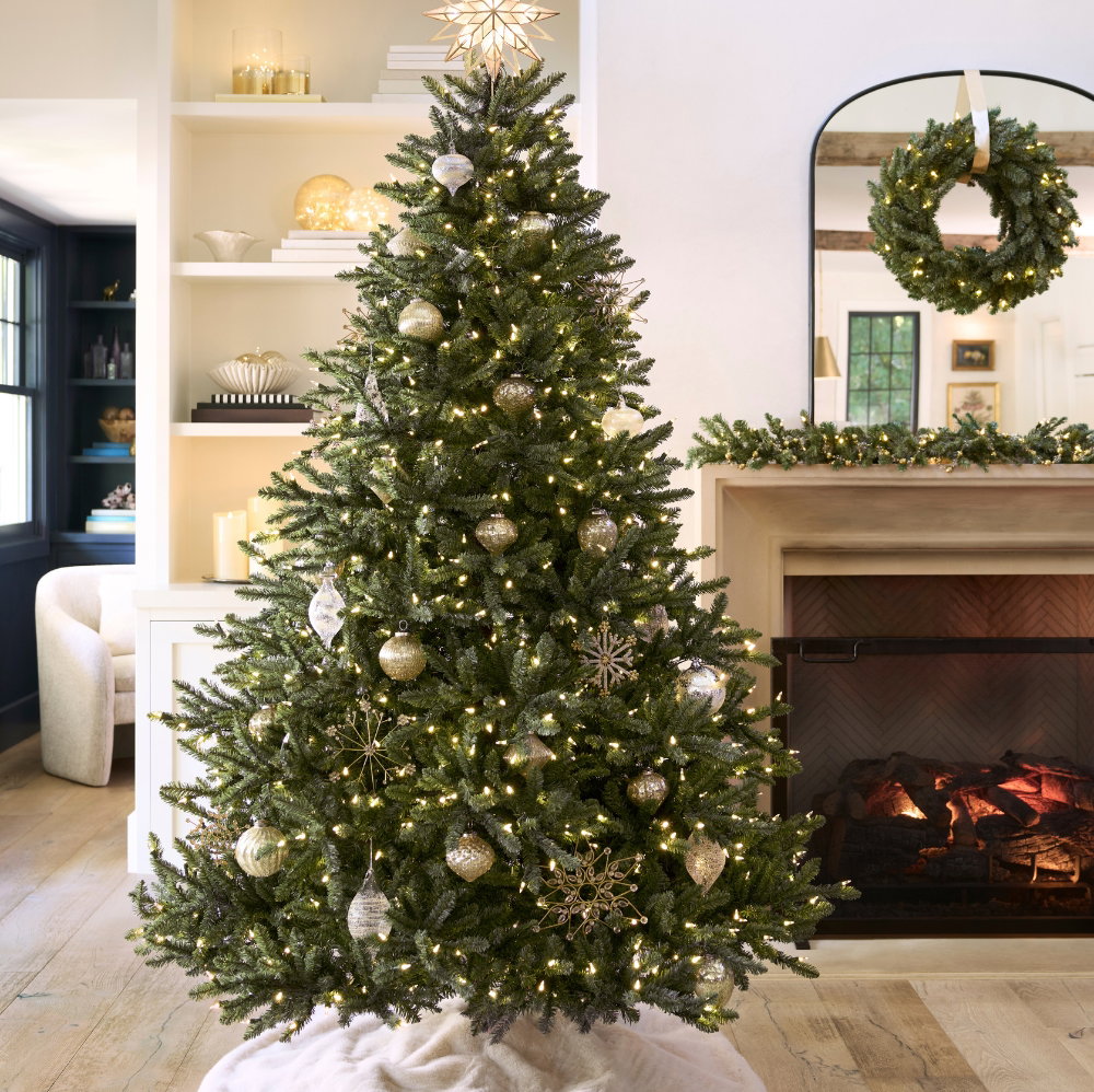 Classic Blue Spruce Tree and matching greenery in a living room setting