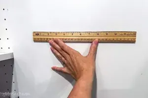 She measured the inside of her kitchen cabinet for this cute and handy idea