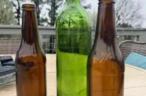 Who knew empty wine bottles could make your outdoor decor even more beautiful this summer?