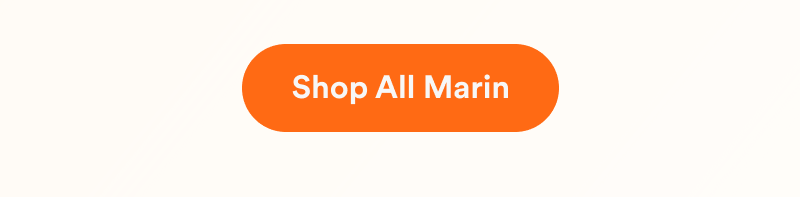 Rounded orange button with white text reading “Shop All Marin.”