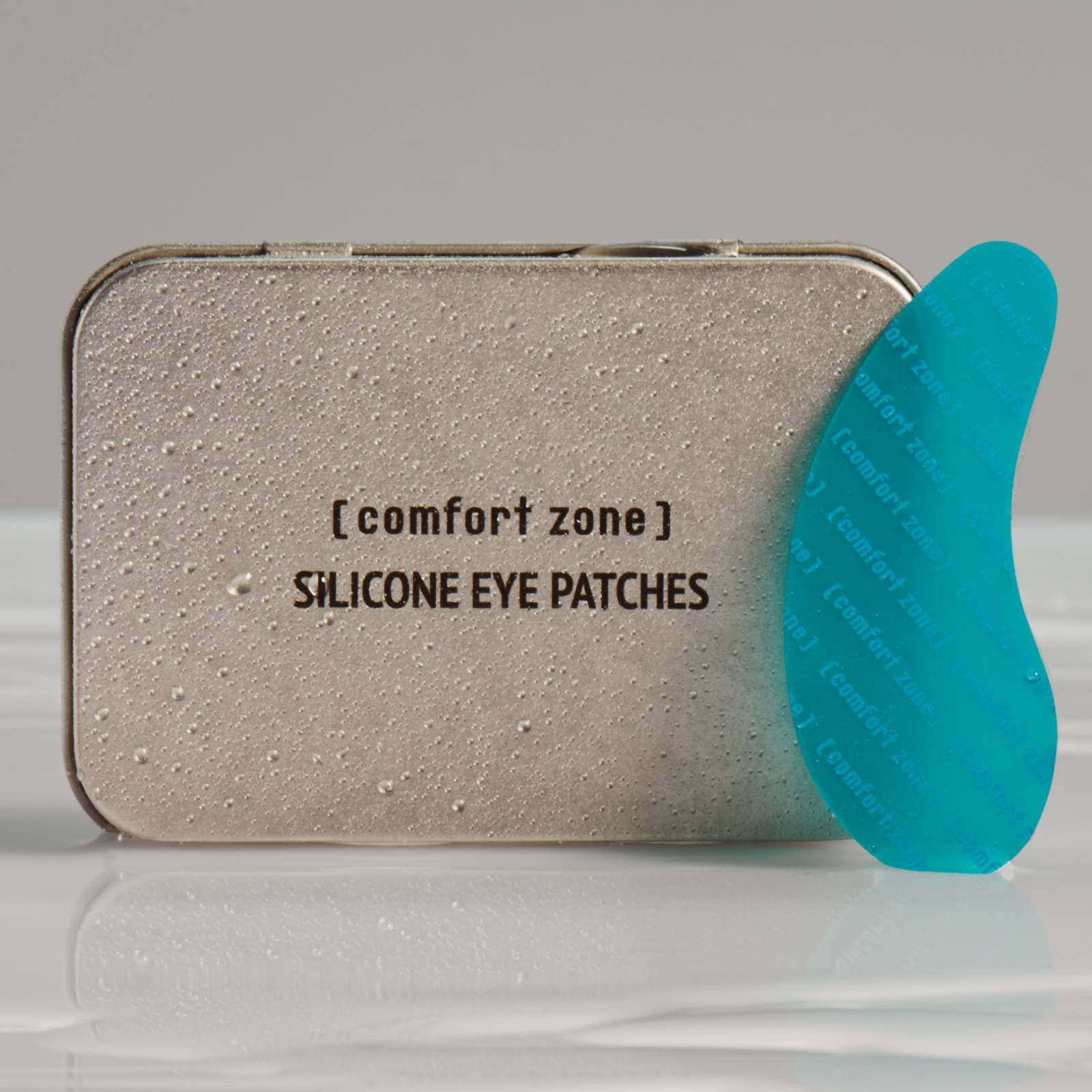 Silicone Eye Patches container and blue eye patch with water droplets