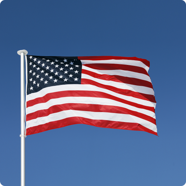 Memorial Day tribute banner with waving American flag.