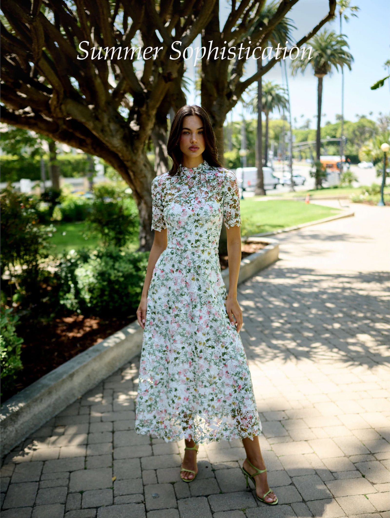 Monique Lhuillier floral printed lace midi dress with short sleeves.