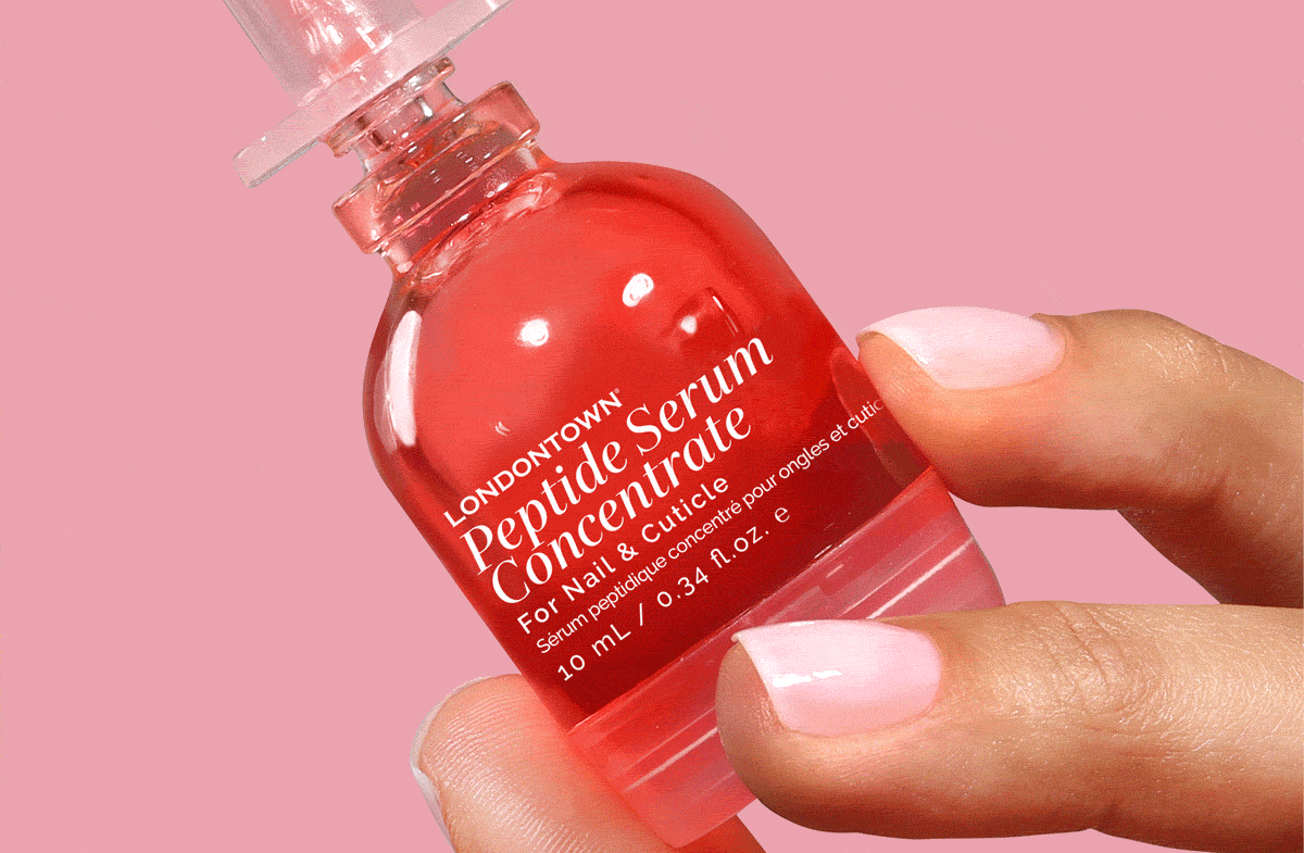 Sheer Strength Nail Blush being applied on nails