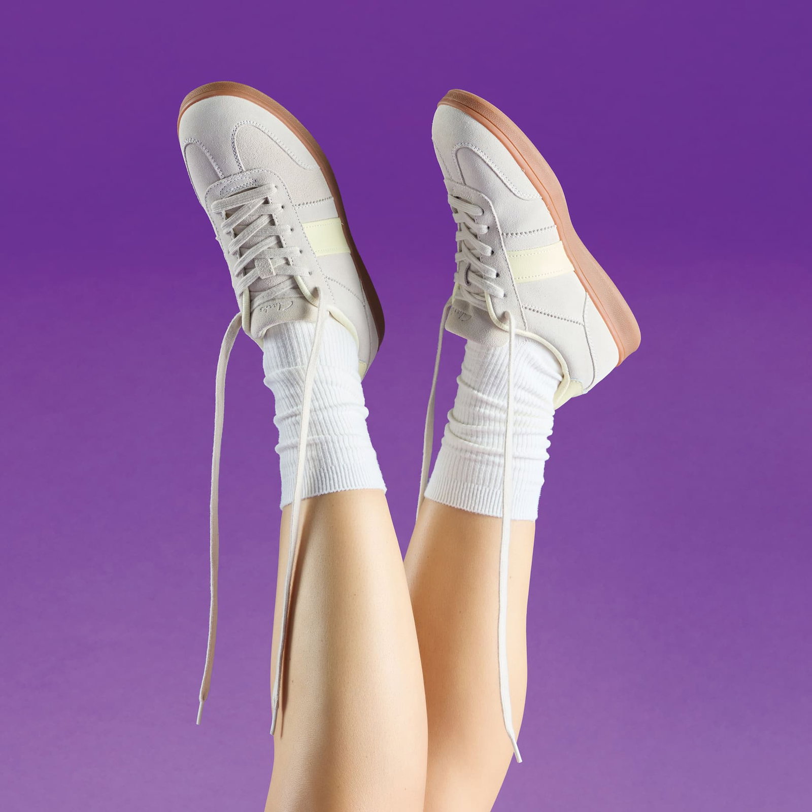 Model wearing Clarks women's trainers