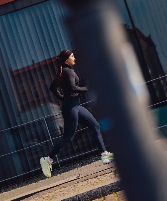 Woman in lululemon top and tights
