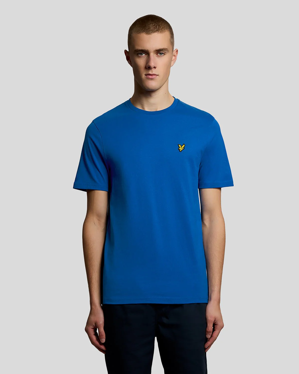 Model wears classic crew neck t-shirt in opal blue