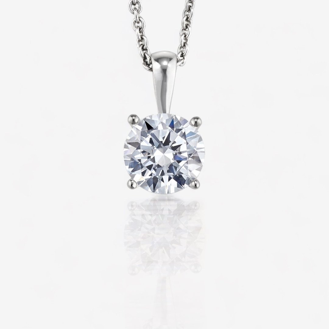 CUSTOM FOUR-PRONG ROUND SOLITAIRE DIAMOND PENDANT