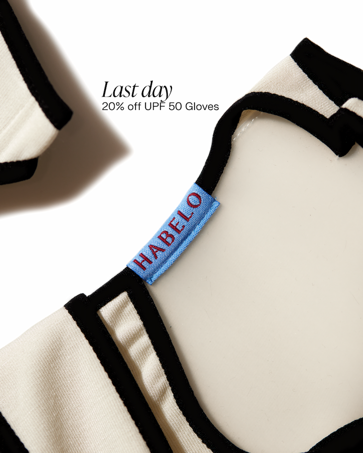 Editorial image of Habelo UPF 50 Treatment-Boosting Gloves in soft ivory with black trim, featuring a blue Habelo tag detail. Text overlay reads ‘Last day — 20% off UPF 50 Gloves.